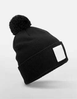 Beechfield Appliqué Patch Pom Beanie in Black/White, voorkant